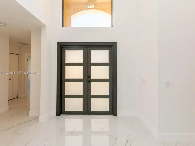 a view of a bathroom with a window