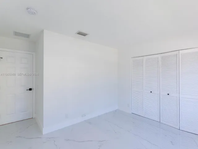 a view of a lake with a city view