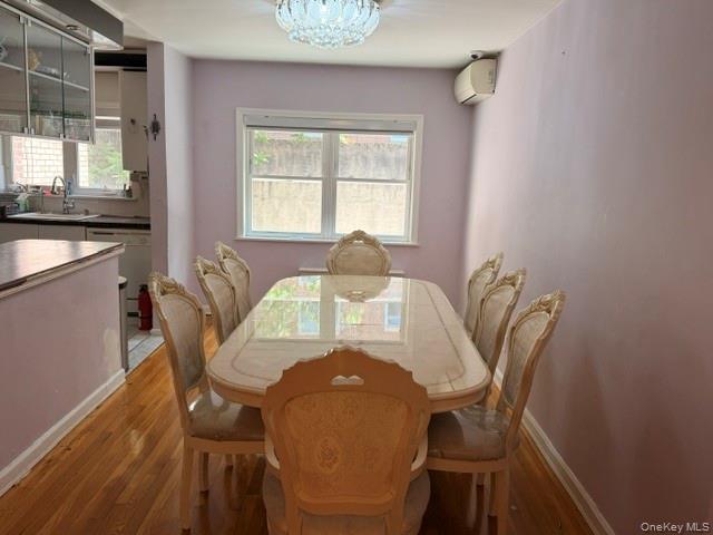 150-06 78th Road Queens, NY 11367 - Photo 5 of 22 a view of a dining room with furniture and window