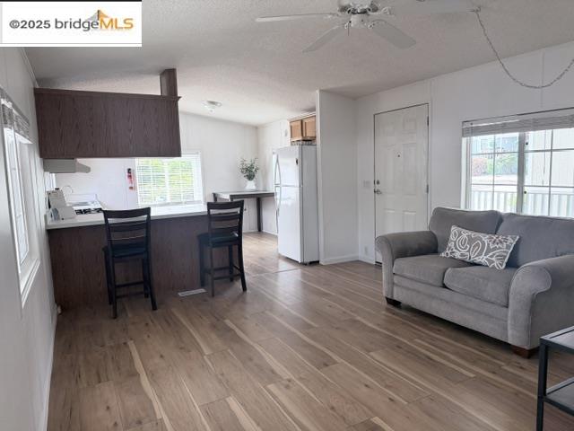 View of front of home with a wooden deck