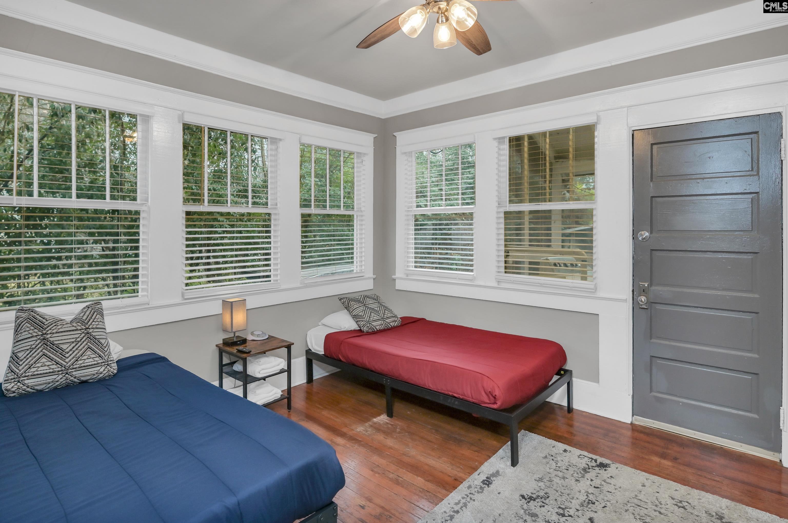 2227 Bull Street Columbia, SC 29201 - Photo 32 of 38 a living room with furniture and windows