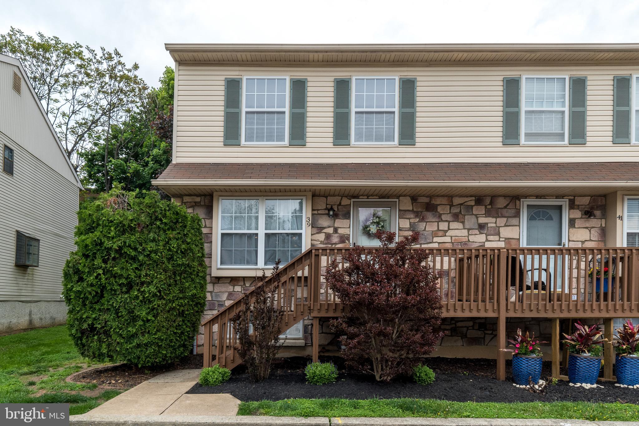 7923 Ridge Avenue, Unit 39 Philadelphia, PA 19128 - Photo 1 of 32 Front Exterior curb appeal with stone accent