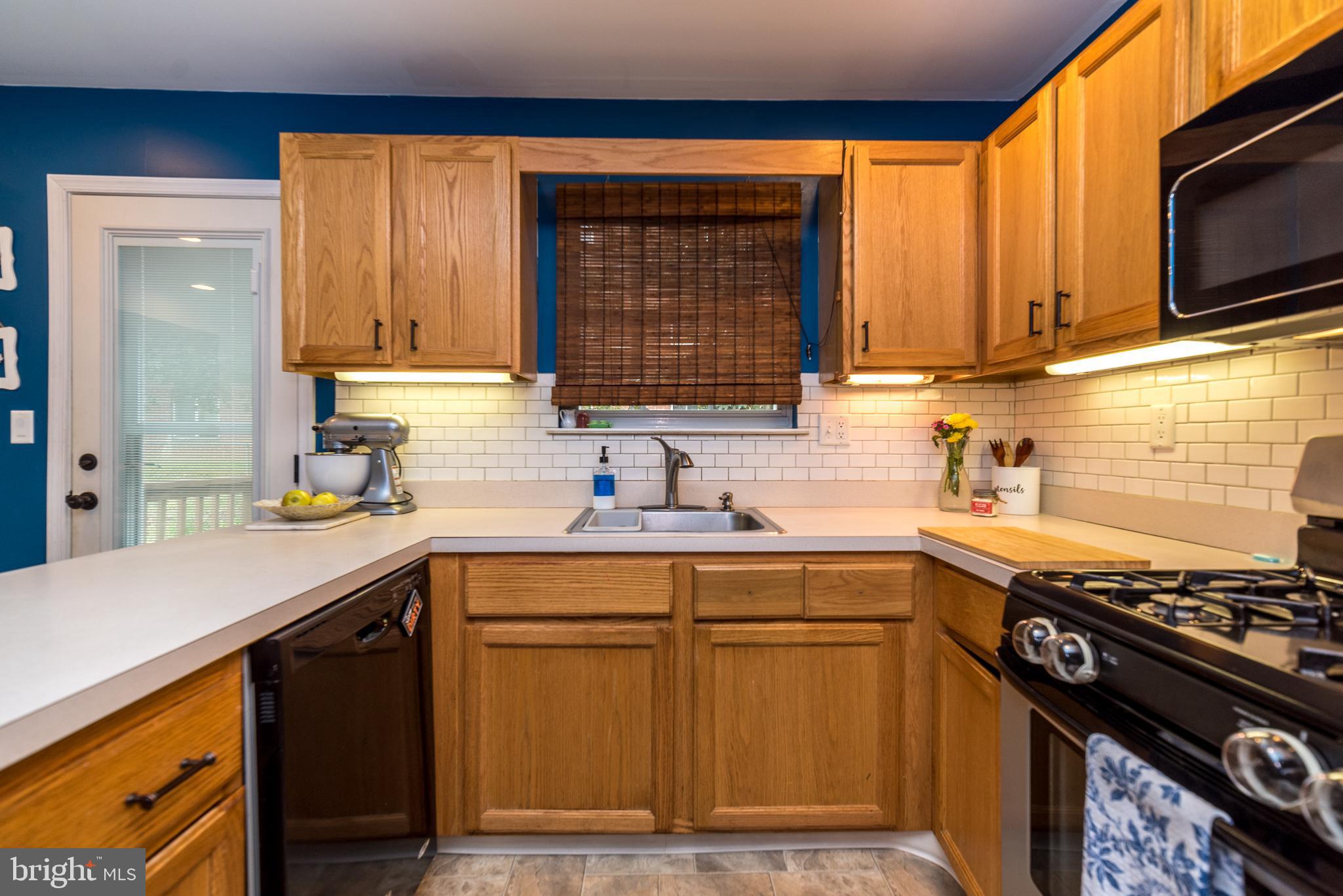 7923 Ridge Avenue, Unit 39 Philadelphia, PA 19128 - Photo 12 of 32 Kitchen with lots of cabinet space