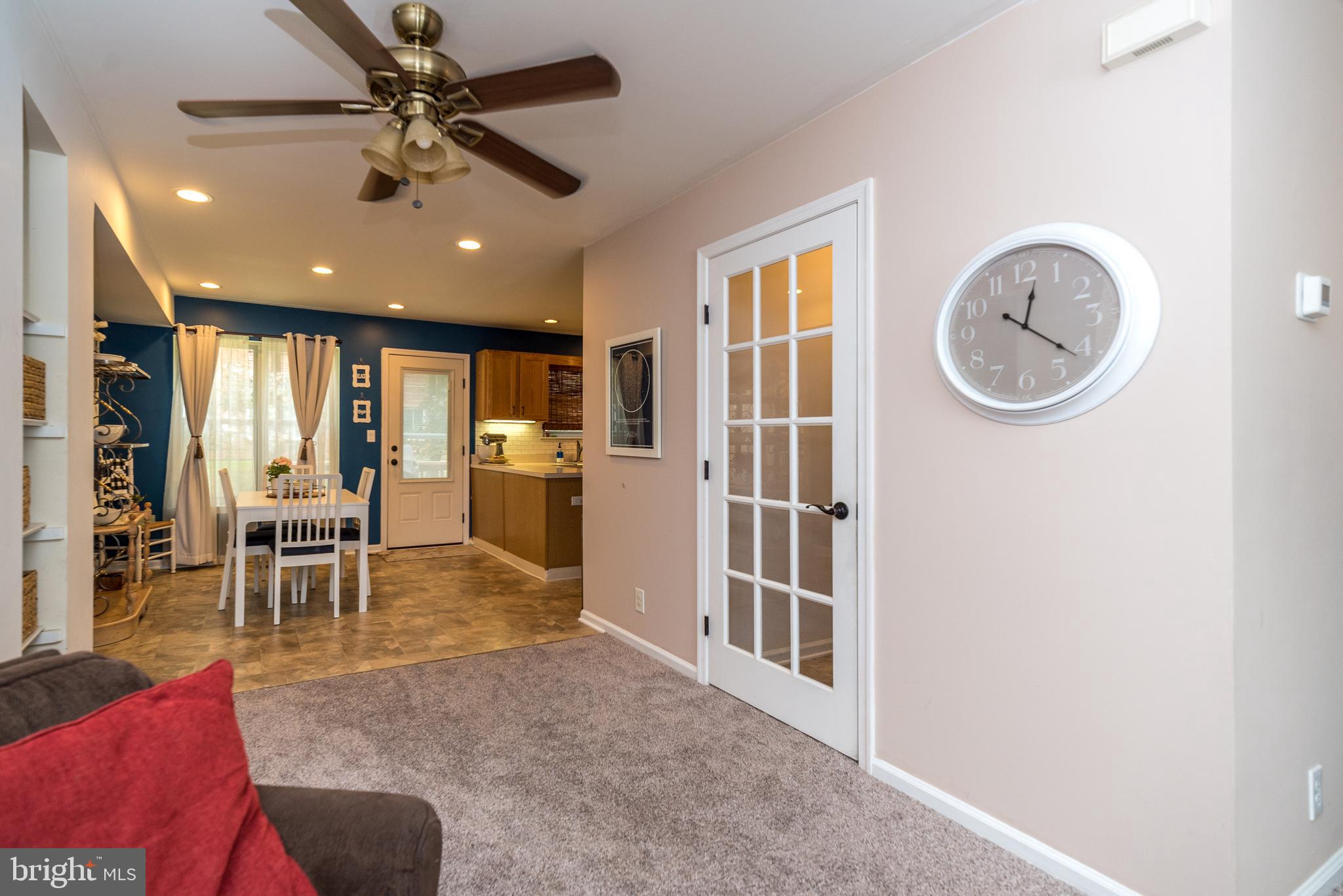 7923 Ridge Avenue, Unit 39 Philadelphia, PA 19128 - Photo 16 of 32 French doors to Laundry, powder room & lower level