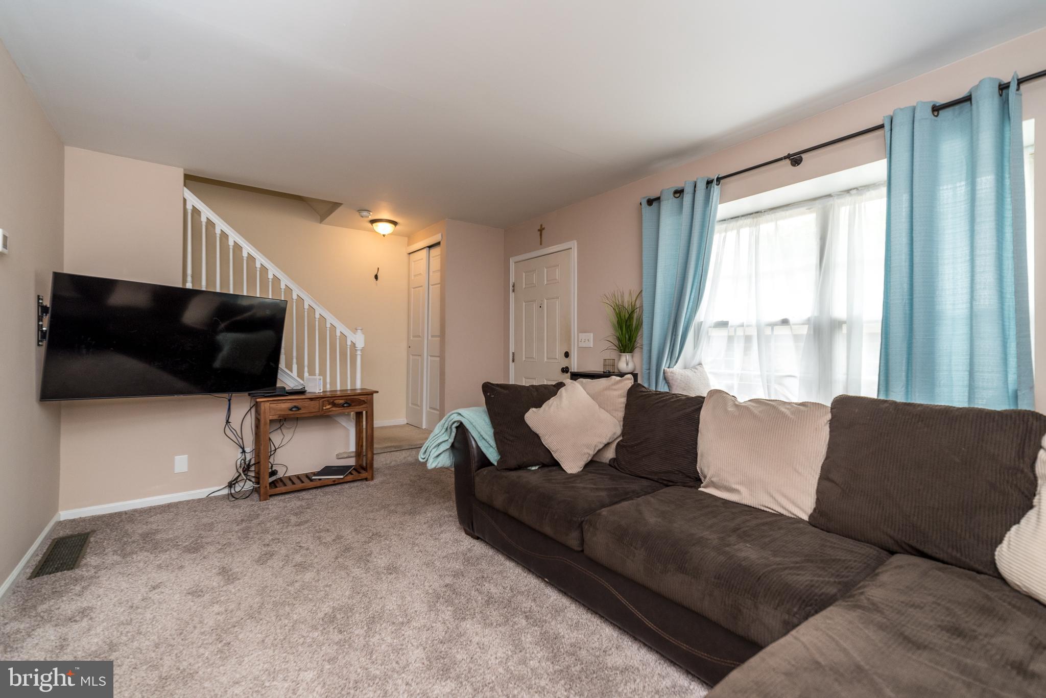 7923 Ridge Avenue, Unit 39 Philadelphia, PA 19128 - Photo 7 of 32 Family room with double windows