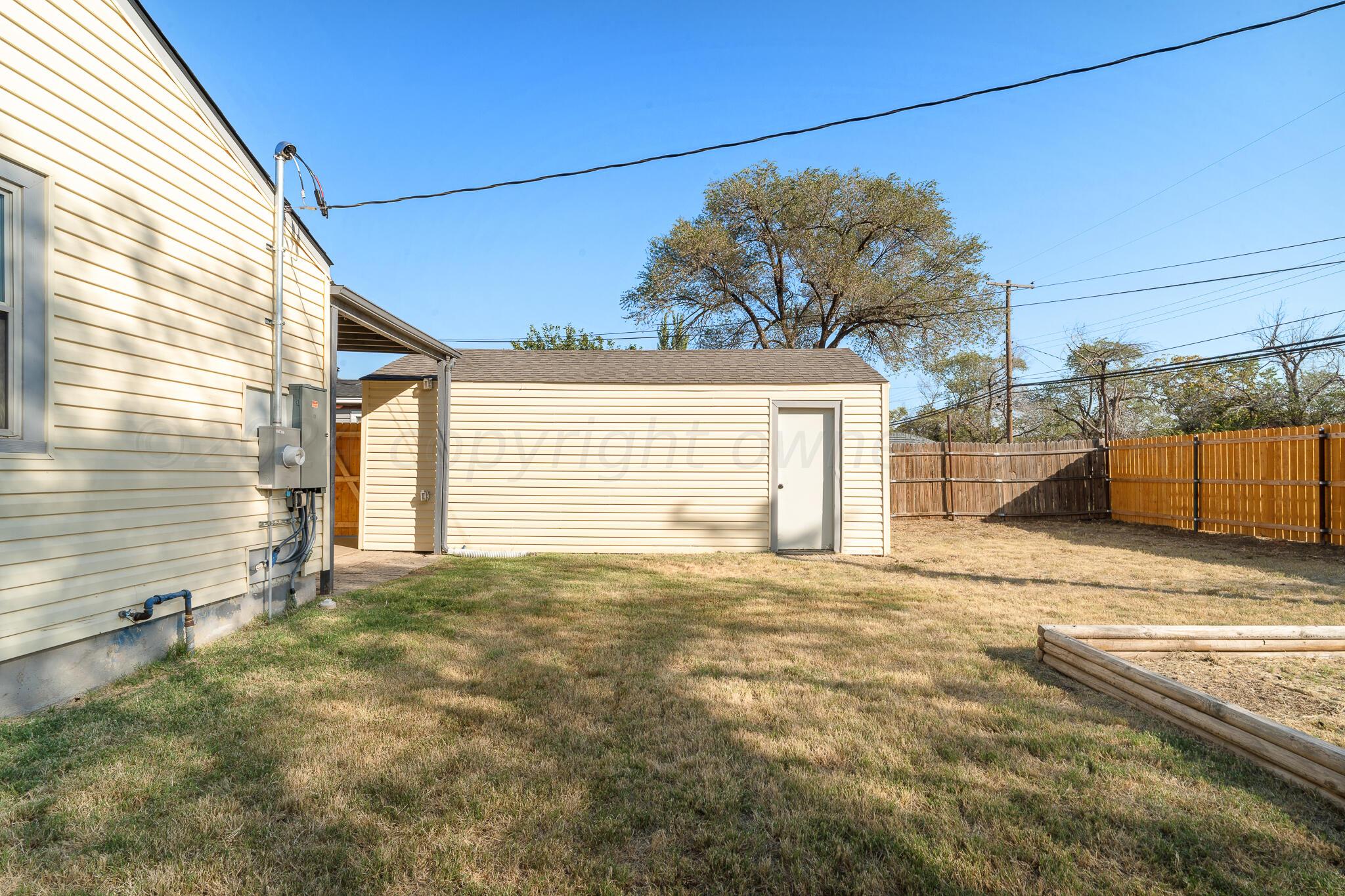 4419 Bowie Street Amarillo, TX 79110 - Photo 13 of 15 a view of a backyard of a house