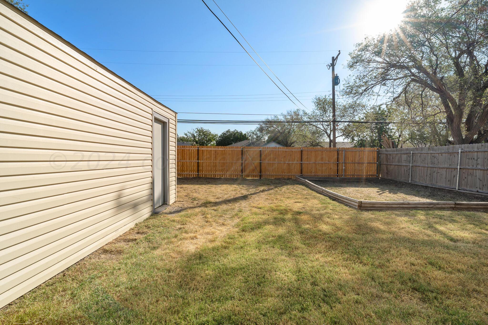 4419 Bowie Street Amarillo, TX 79110 - Photo 14 of 15 a view of a backyard