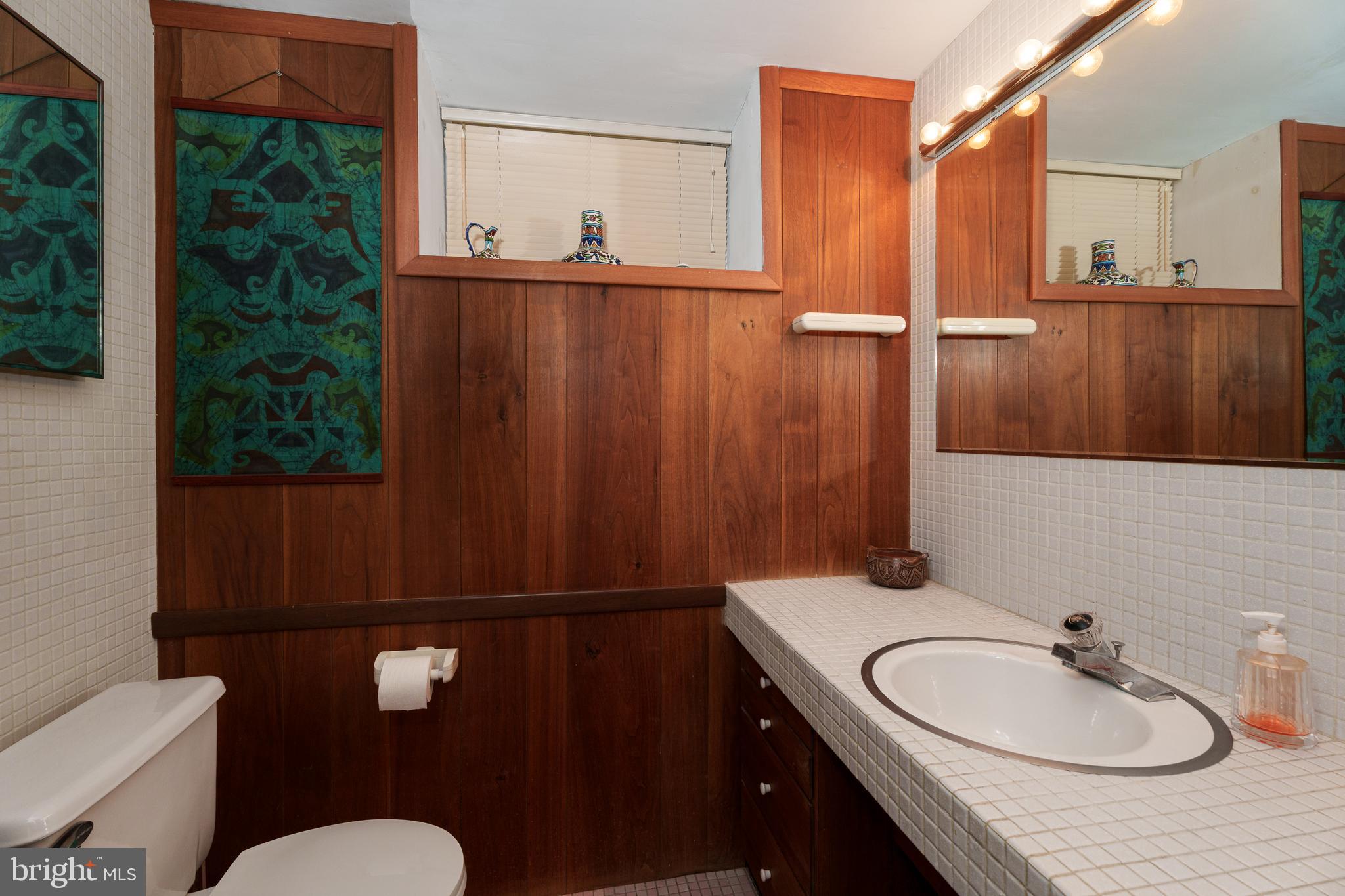 83 Random Road Princeton, NJ 08540 - Photo 29 of 36 a bathroom with a sink toilet and mirror