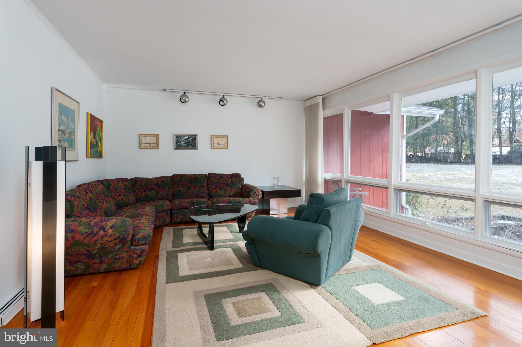 83 Random Road Princeton, NJ 08540 - Photo 8 of 36 a living room with furniture and a large window