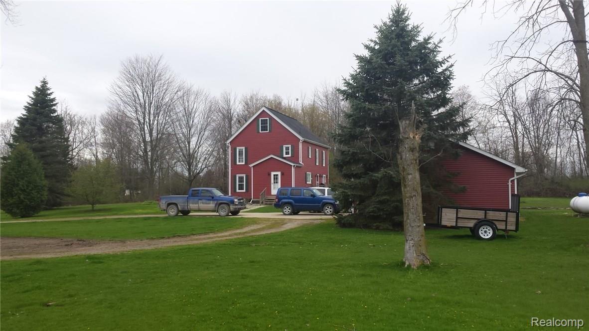 9772 Bryce Road Avoca, MI 48006 - Photo 19 of 26 This is a view of the side yard.
