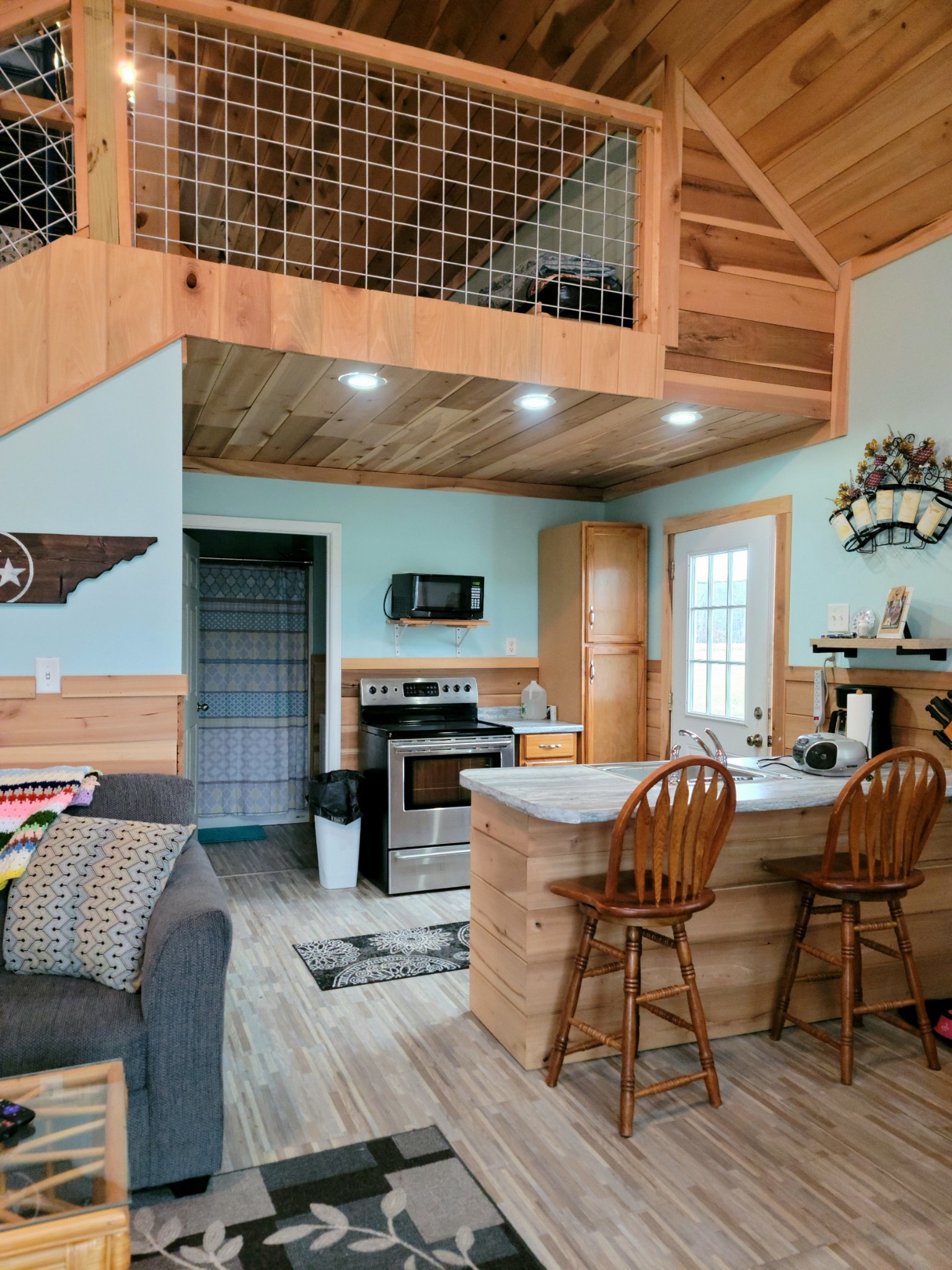 485 Creekside View Lane Decaturville, TN 38329 - Photo 1 of 31 a kitchen with a table chairs and a stove