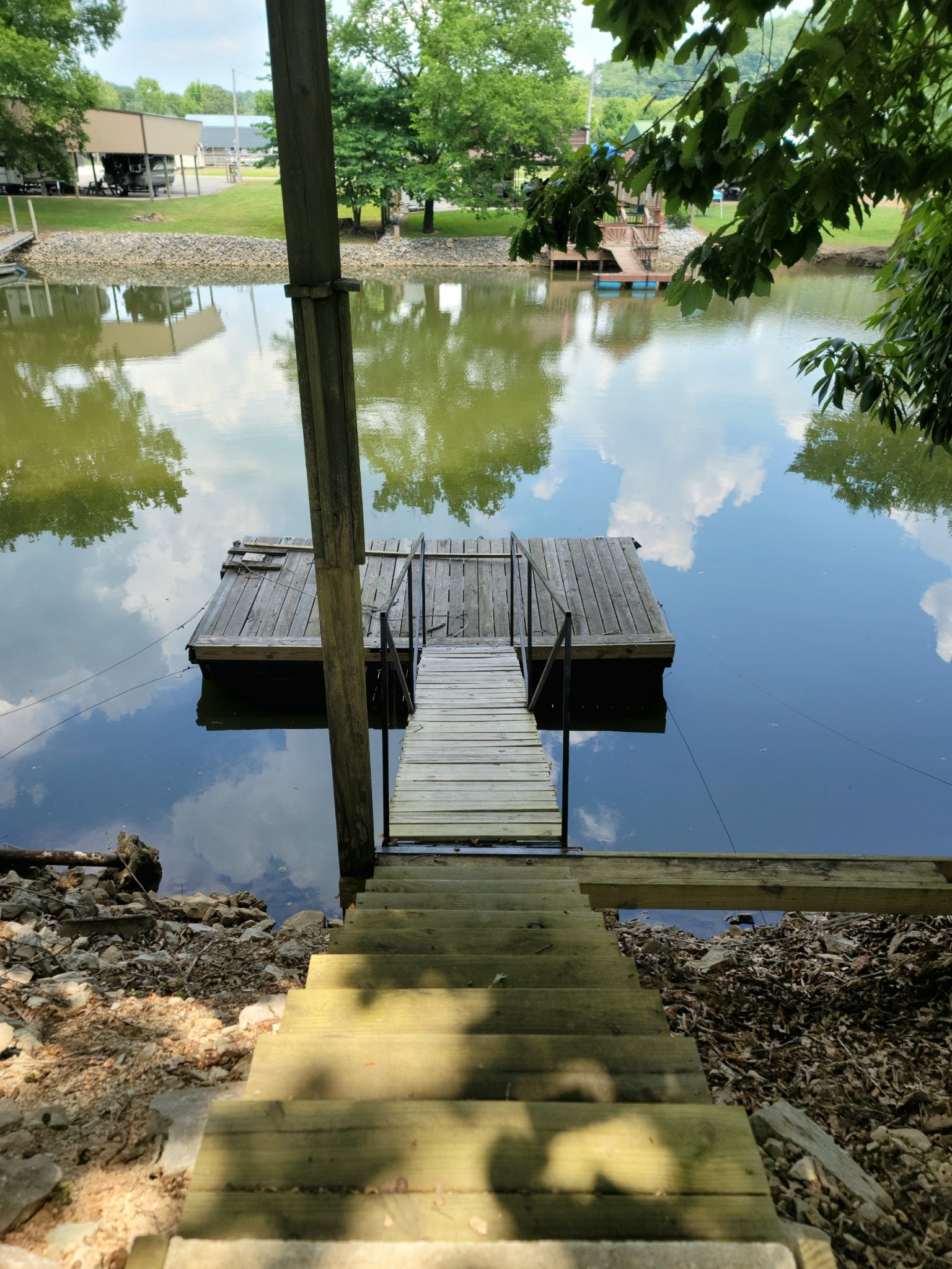 485 Creekside View Lane Decaturville, TN 38329 - Photo 25 of 31 a view of a lake with houses