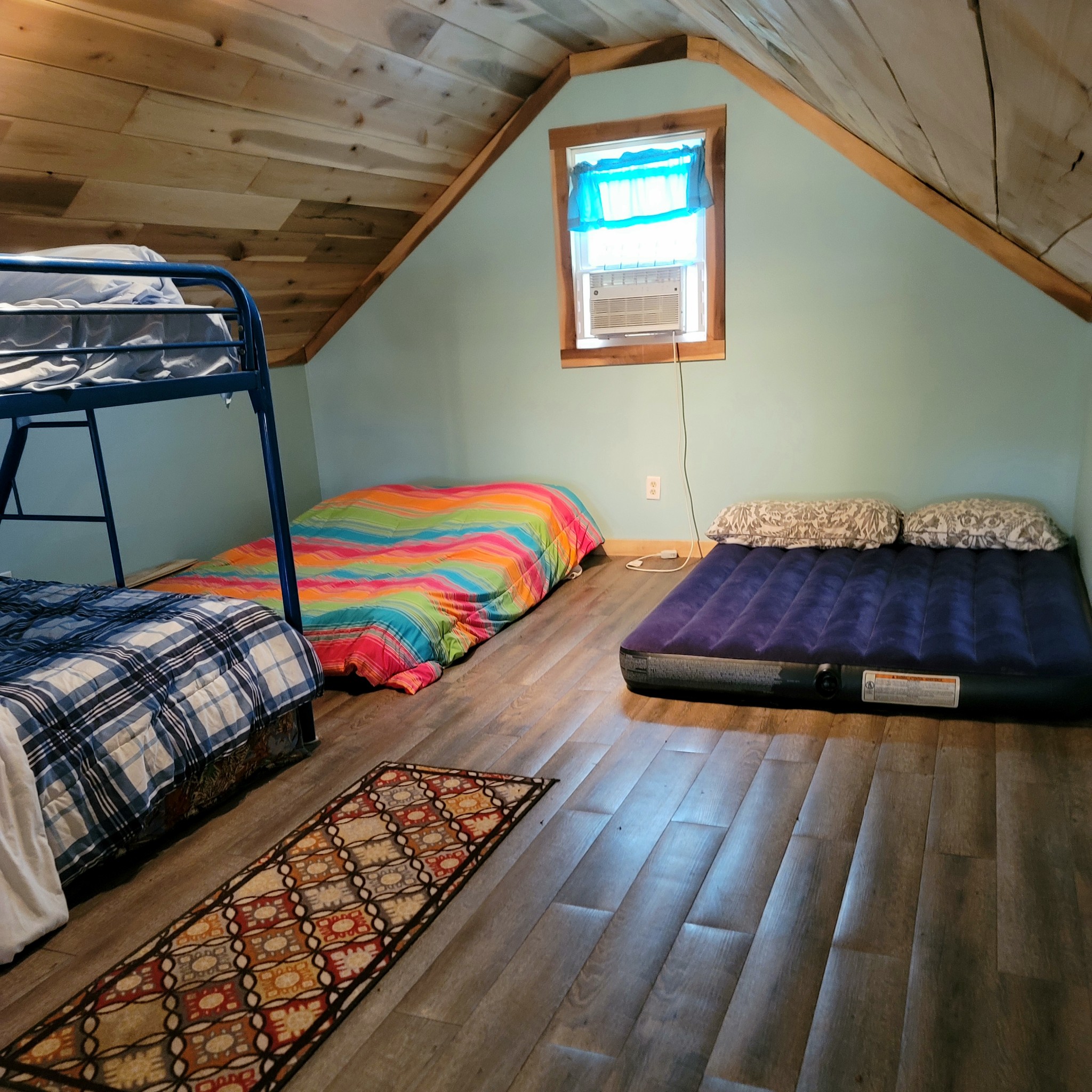 485 Creekside View Lane Decaturville, TN 38329 - Photo 7 of 31 a bedroom with bed and a window