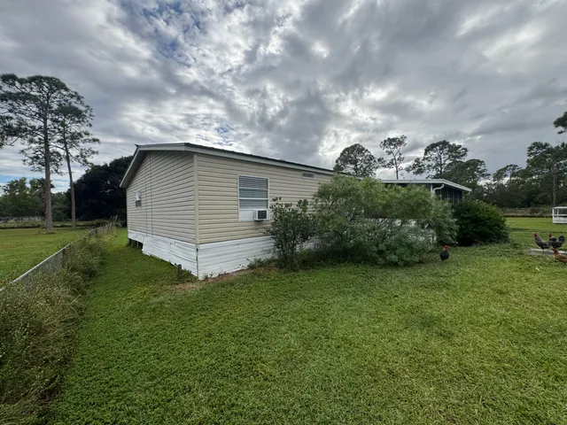a view of a lake with a big yard