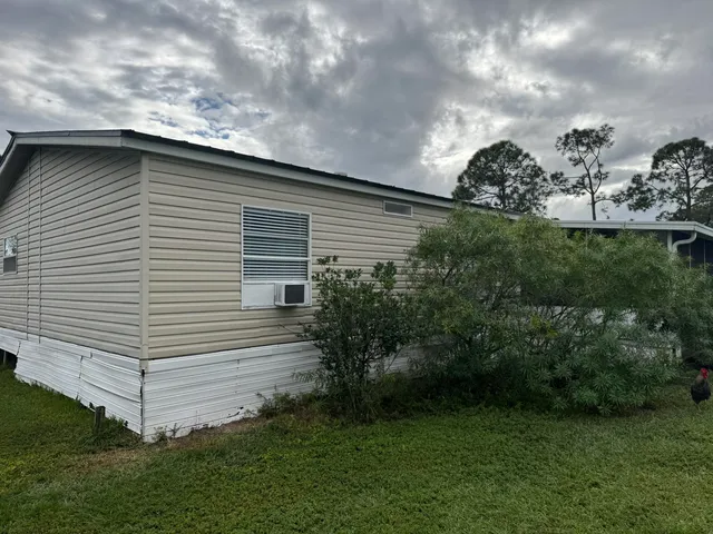 a view of a backyard with a garden