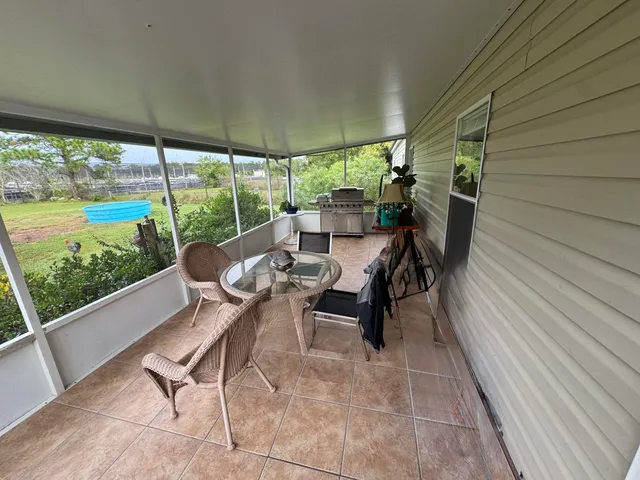 a view of a livingroom with a furniture