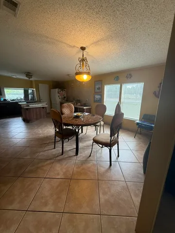 a bedroom with a bed and a view of en suite bathroom