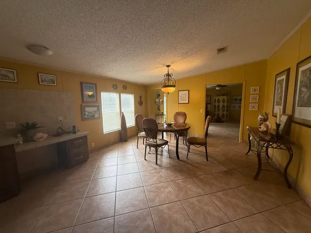 a view of a hallway with workspace