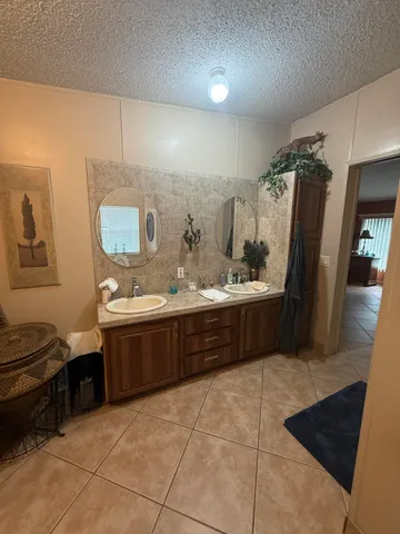 a bathroom with a toilet and shower