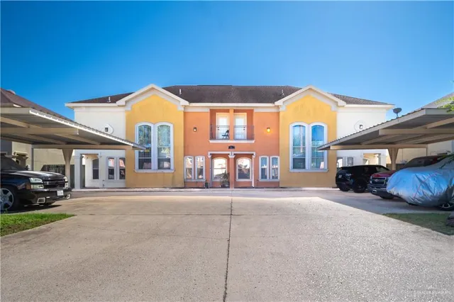 a view of a car park in front of a building