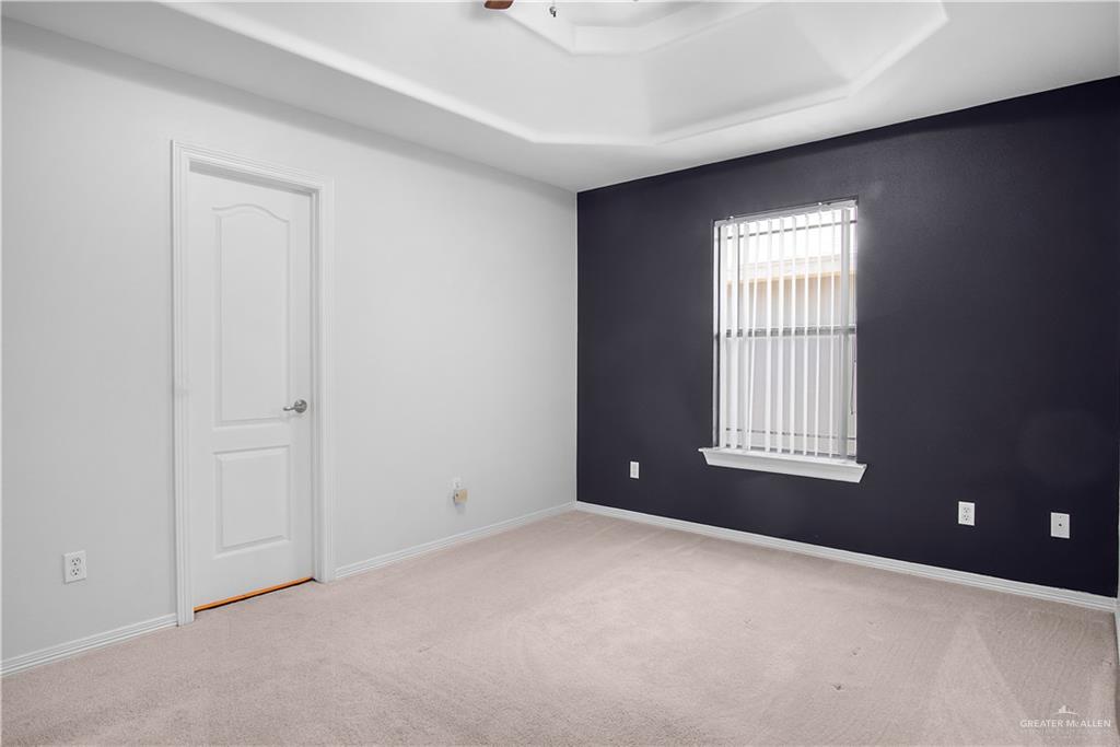 1309 West Fig Avenue, Unit A Pharr, TX 78577 - Photo 11 of 15 a view of an empty room with a window