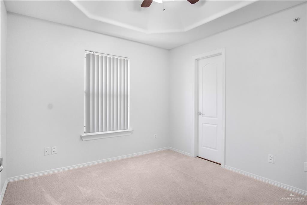 1309 West Fig Avenue, Unit A Pharr, TX 78577 - Photo 12 of 15 an empty room with windows