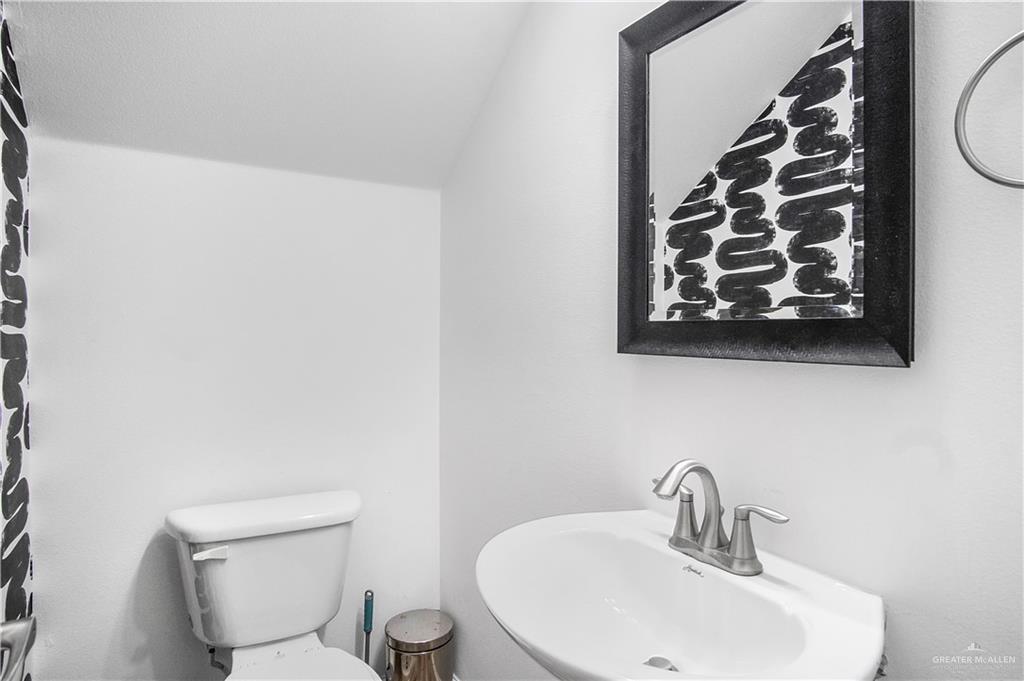 1309 West Fig Avenue, Unit A Pharr, TX 78577 - Photo 8 of 15 a bathroom with a toilet and a sink