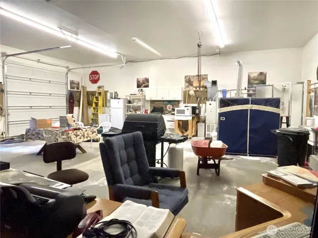 a living room with furniture and view of living room