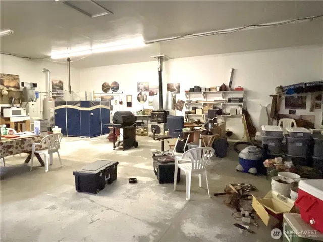 a room with gym equipment and a view of living room