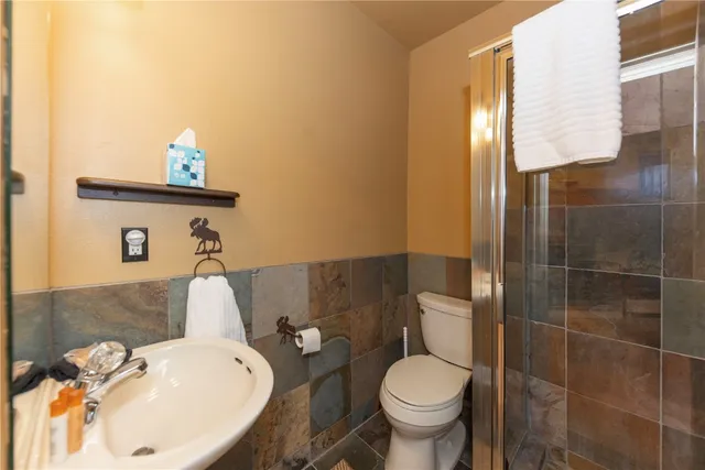 a bathroom with a sink and a toilet