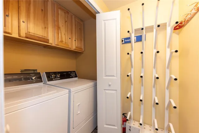 a view of a house with a lot of flower plants