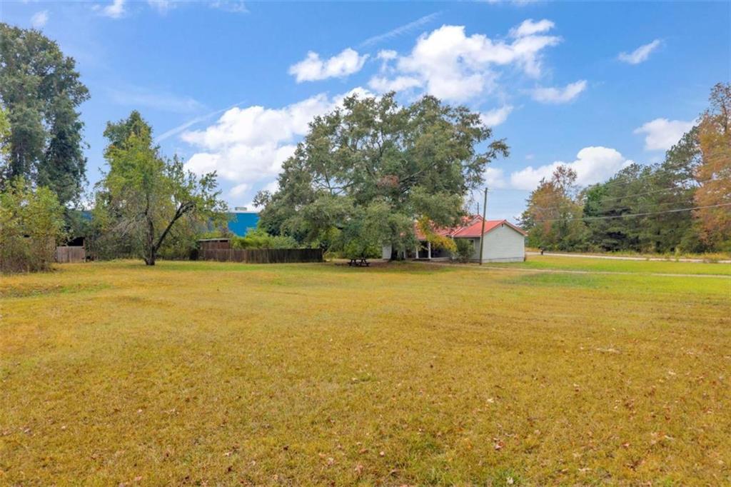 11118 City Pond Road Covington, GA 30014 - Photo 21 of 24 a view of ocean and trees