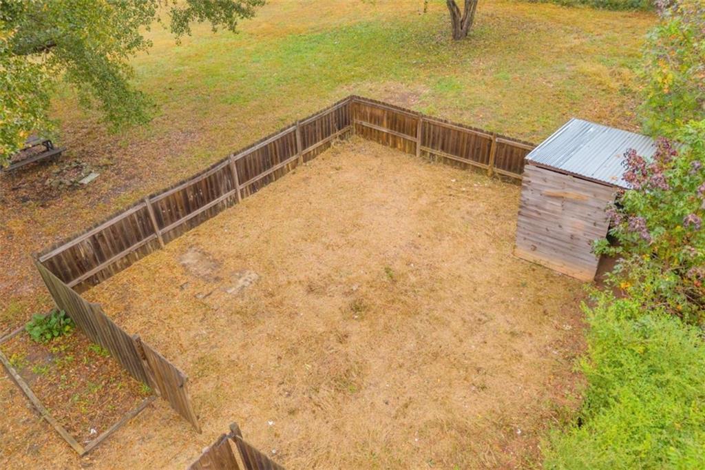 11118 City Pond Road Covington, GA 30014 - Photo 22 of 24 a view of a swimming pool