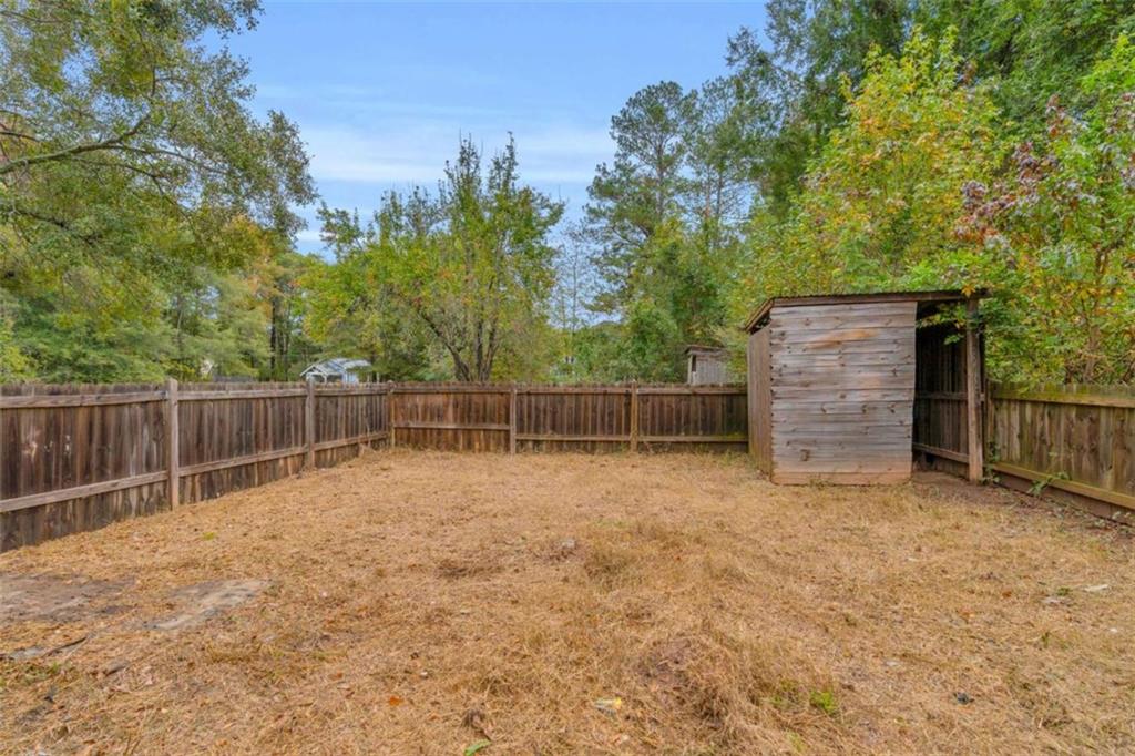 11118 City Pond Road Covington, GA 30014 - Photo 23 of 24 a backyard of a house