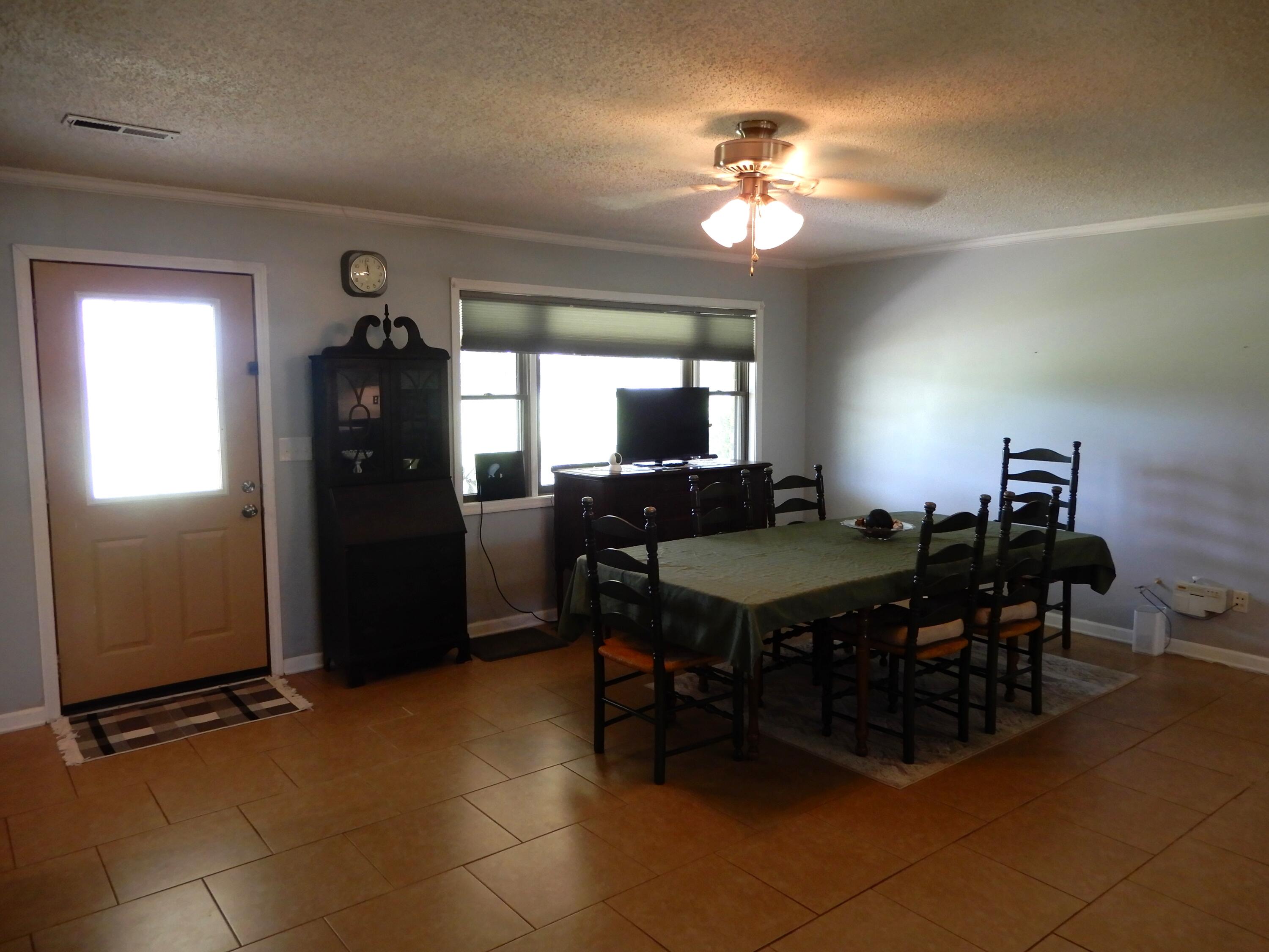 1875 State Route 384 Fancy Farm, KY 42039 - Photo 25 of 72 Dining room table in the Living room space.