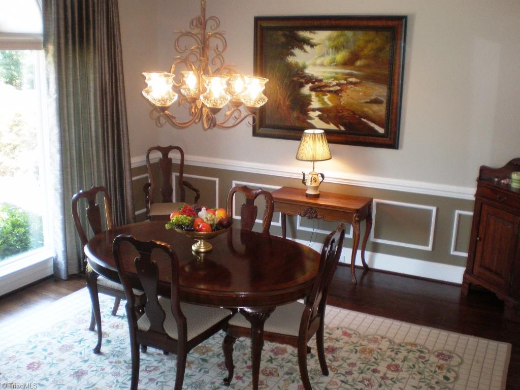 8506 Case Ridge Drive Oak Ridge, NC 27310 - Photo 13 of 30 Large Dining Room with Custom Chair Rail and Mouldings
