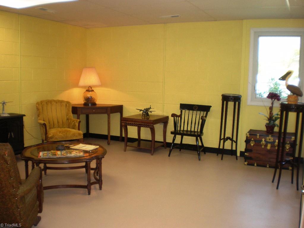 8506 Case Ridge Drive Oak Ridge, NC 27310 - Photo 28 of 30 Sitting Area of Finished Basement.