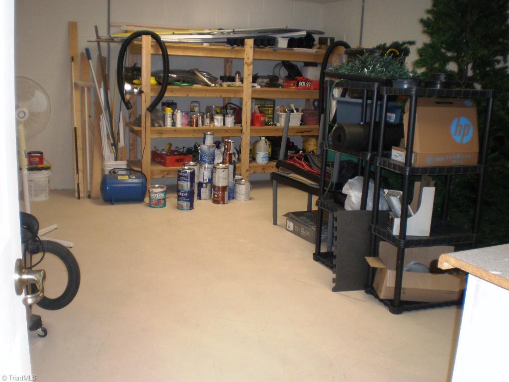 8506 Case Ridge Drive Oak Ridge, NC 27310 - Photo 29 of 30 Workshop/Storage Room Not Included in the Finished Basement Square Foot Though a Register Vent Could Be Easily Added.
