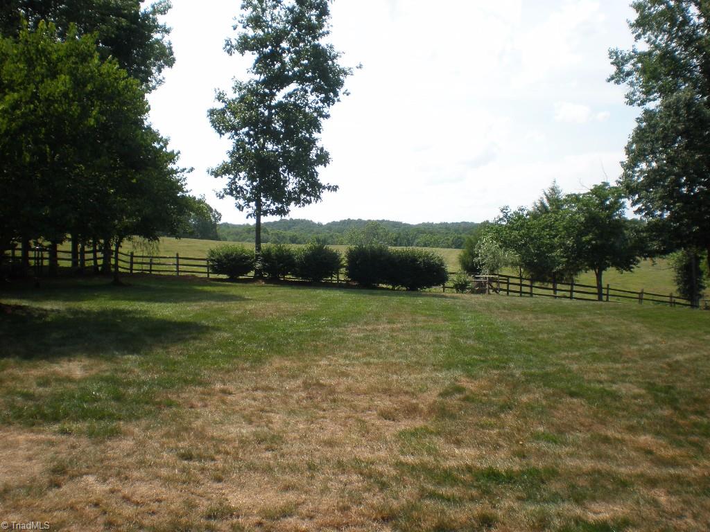 8506 Case Ridge Drive Oak Ridge, NC 27310 - Photo 8 of 30 The View! The Most Beautiful Sunsets Happen Over This Rolling Pasture.