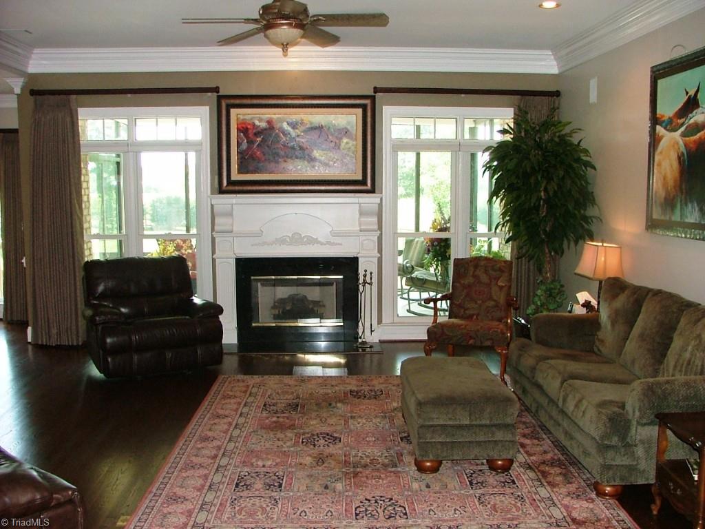 8506 Case Ridge Drive Oak Ridge, NC 27310 - Photo 9 of 30 Living Room with Surround Sound Speakers.