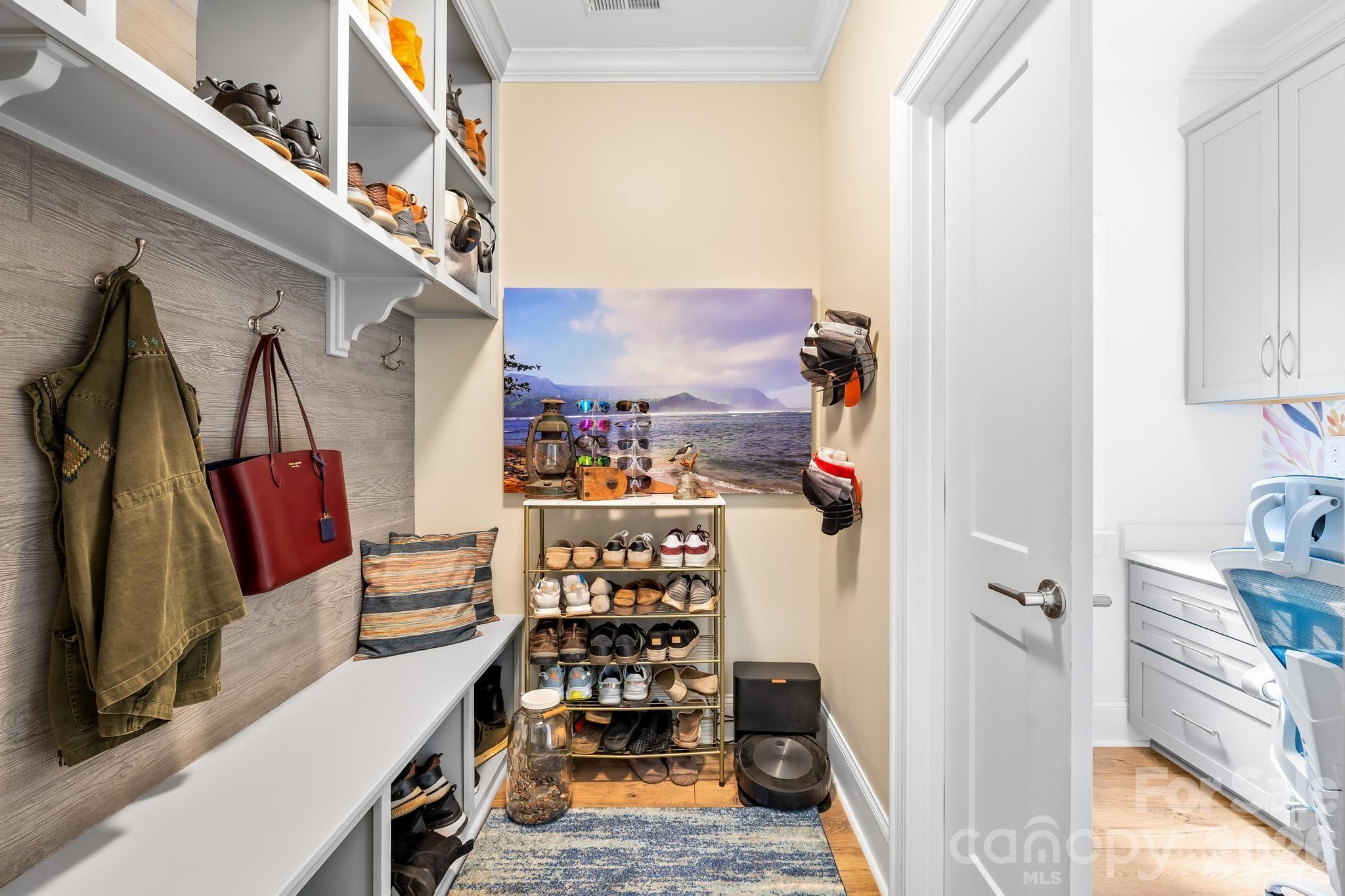 2509 St James Church Road Denver, NC 28037 - Photo 17 of 41 a view of walk in closet with clothes and shoes
