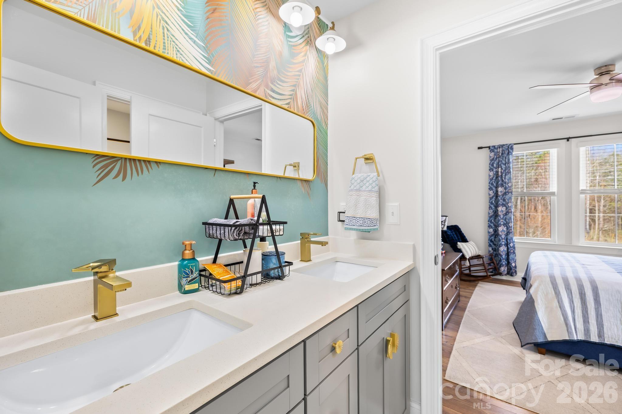 2509 St James Church Road Denver, NC 28037 - Photo 23 of 41 a kitchen with a sink a stove and a table