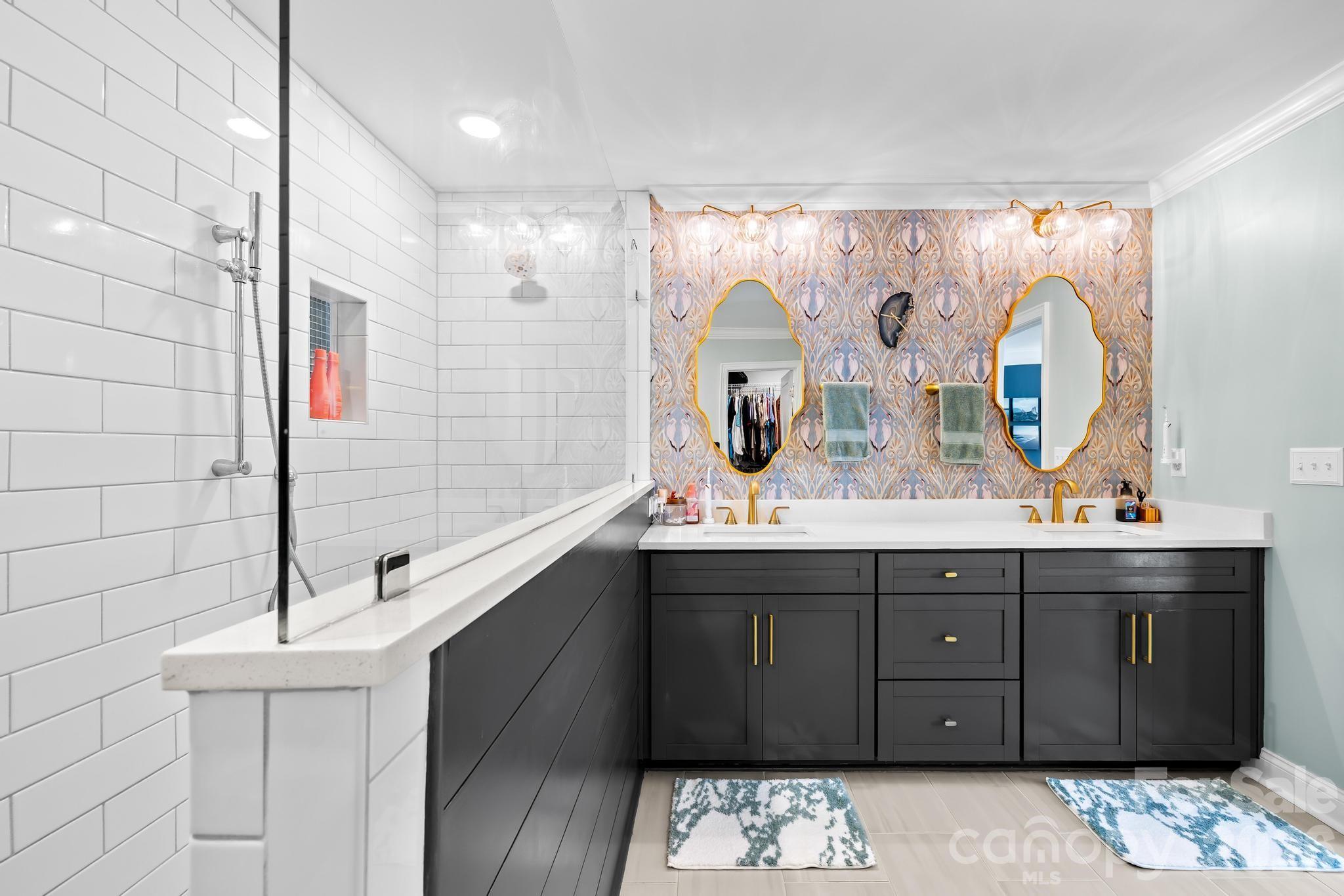 2509 St James Church Road Denver, NC 28037 - Photo 26 of 41 a bathroom with a sink and a mirror