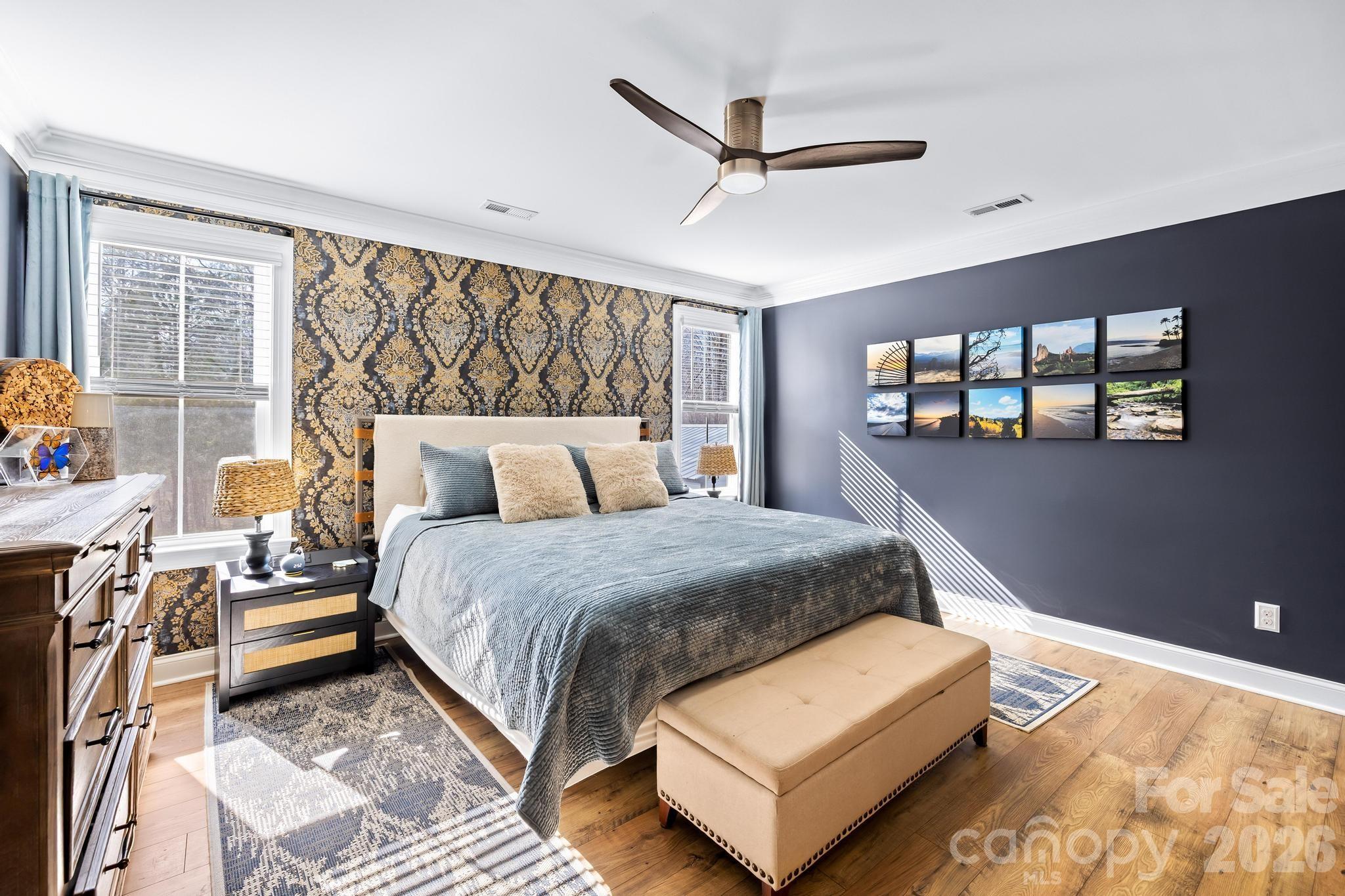 2509 St James Church Road Denver, NC 28037 - Photo 28 of 41 a bedroom with a bed mirror and window