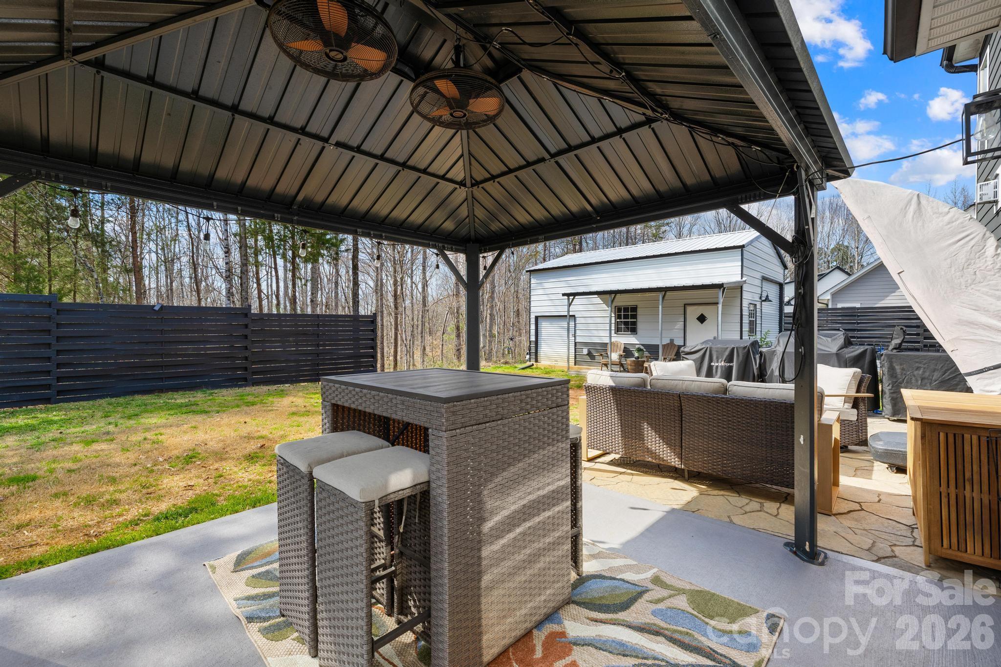 2509 St James Church Road Denver, NC 28037 - Photo 31 of 41 a view of swimming pool with outdoor seating