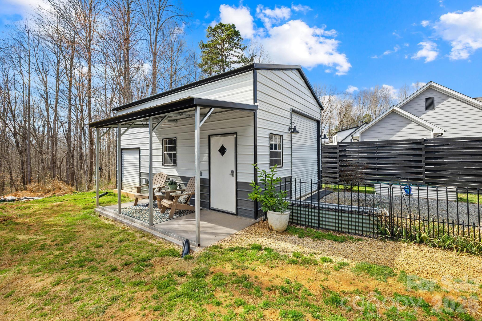 2509 St James Church Road Denver, NC 28037 - Photo 33 of 41 a view of a house with backyard and sitting area