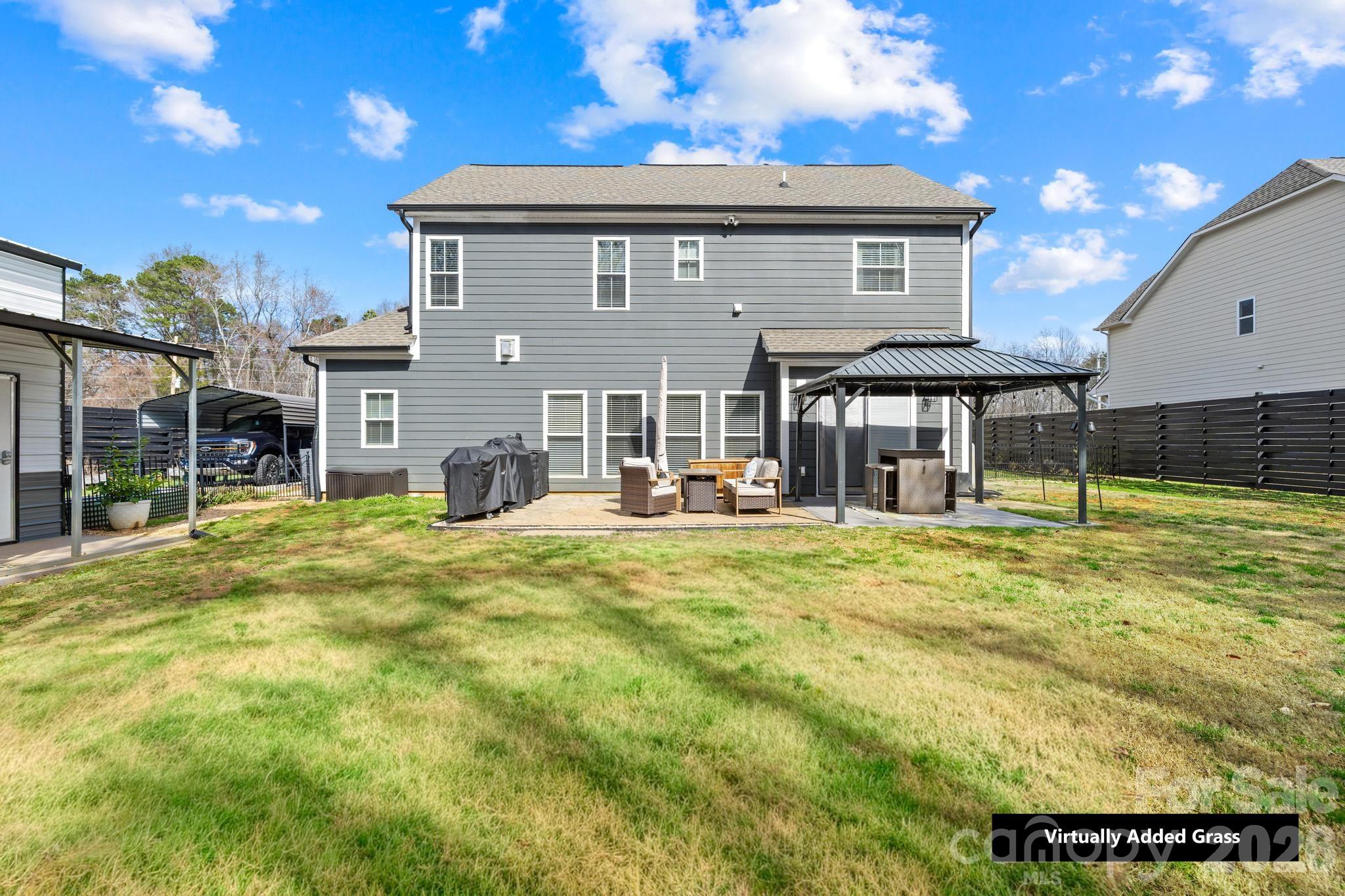 2509 St James Church Road Denver, NC 28037 - Photo 35 of 41 a view of a house with pool and chairs