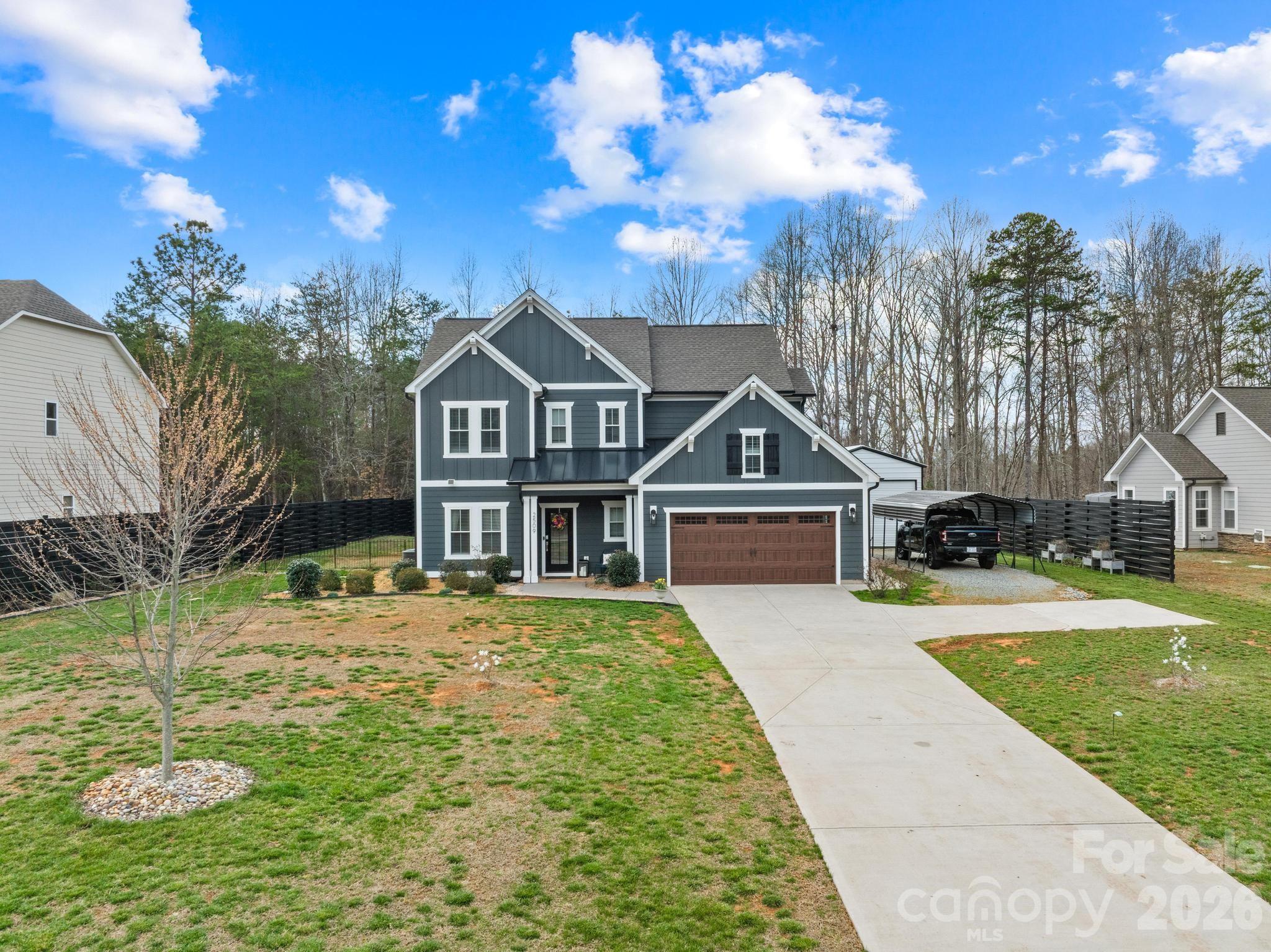 2509 St James Church Road Denver, NC 28037 - Photo 39 of 41 a front view of a house with a yard