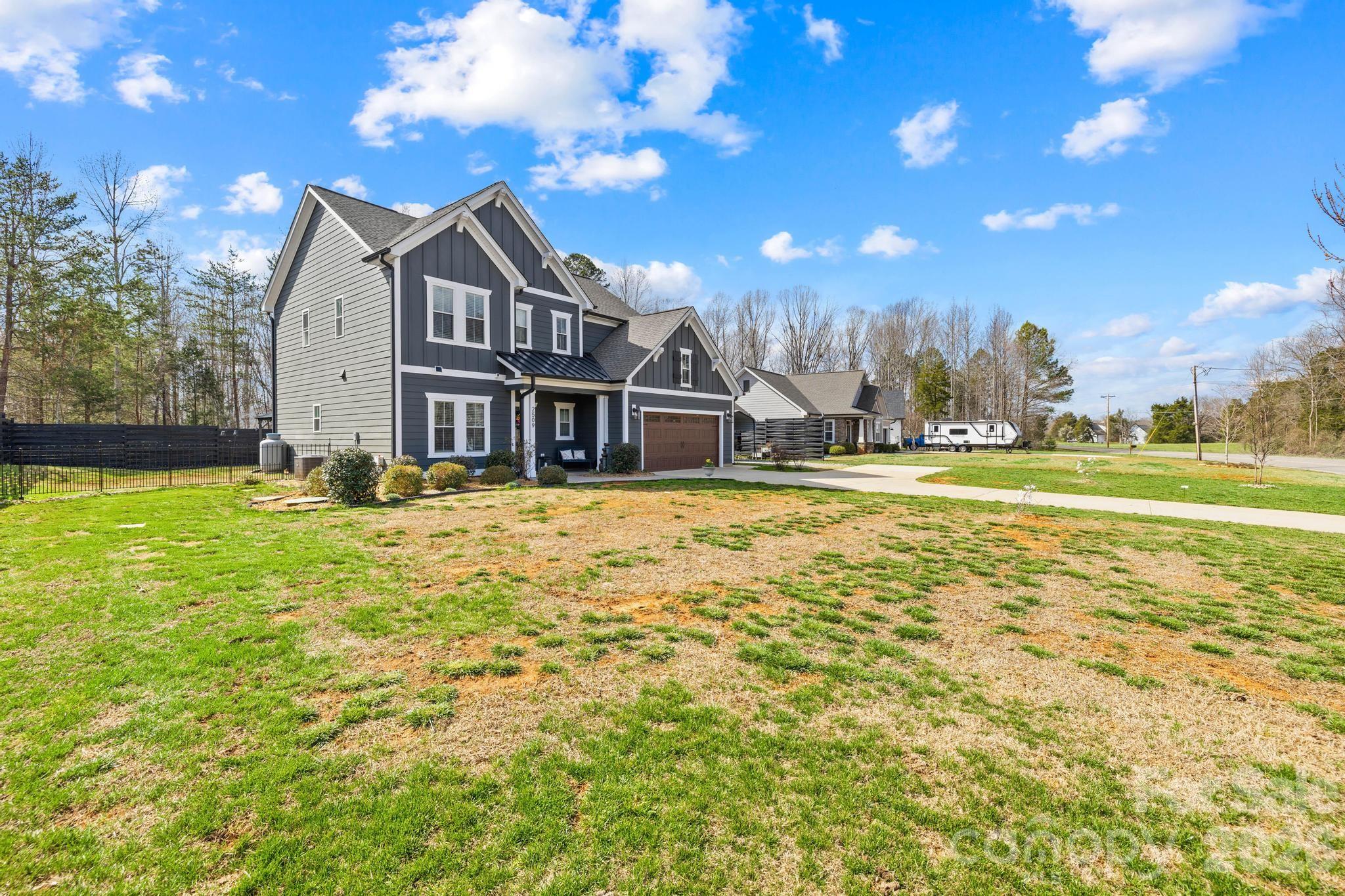 2509 St James Church Road Denver, NC 28037 - Photo 4 of 41 a view of a house with a big yard