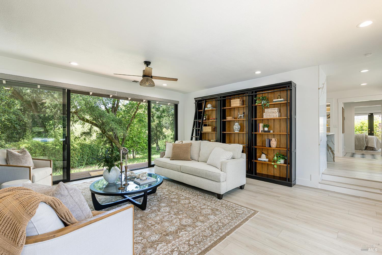 14734 Young Road Healdsburg, CA 95448 - Photo 19 of 47 a living room with furniture and large windows